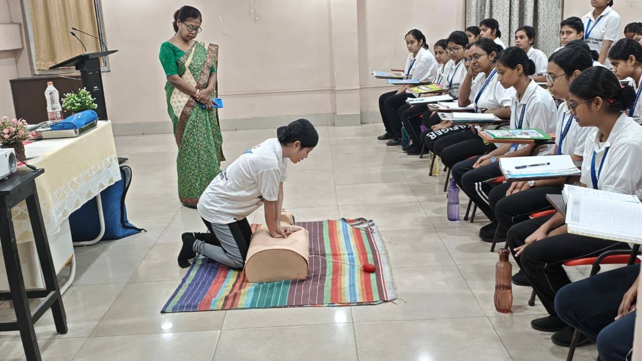 RINMS B.Sc Nursing students practising CPR skills in a Palliative Care training seminar, Durgapur